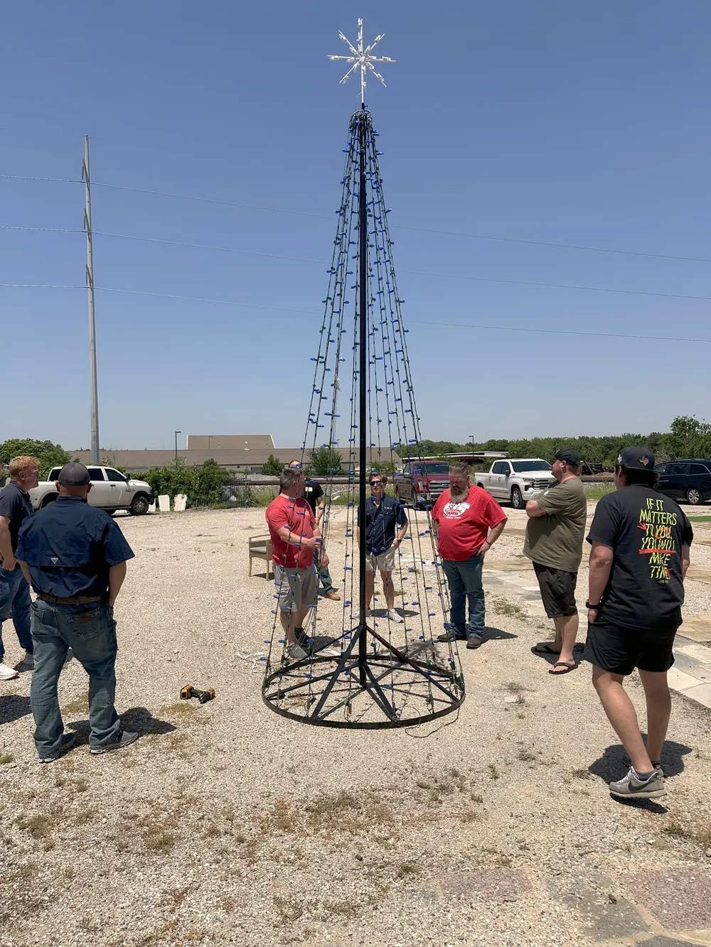 A South Custom Lighting crew building a commercial mega-tree frame on site